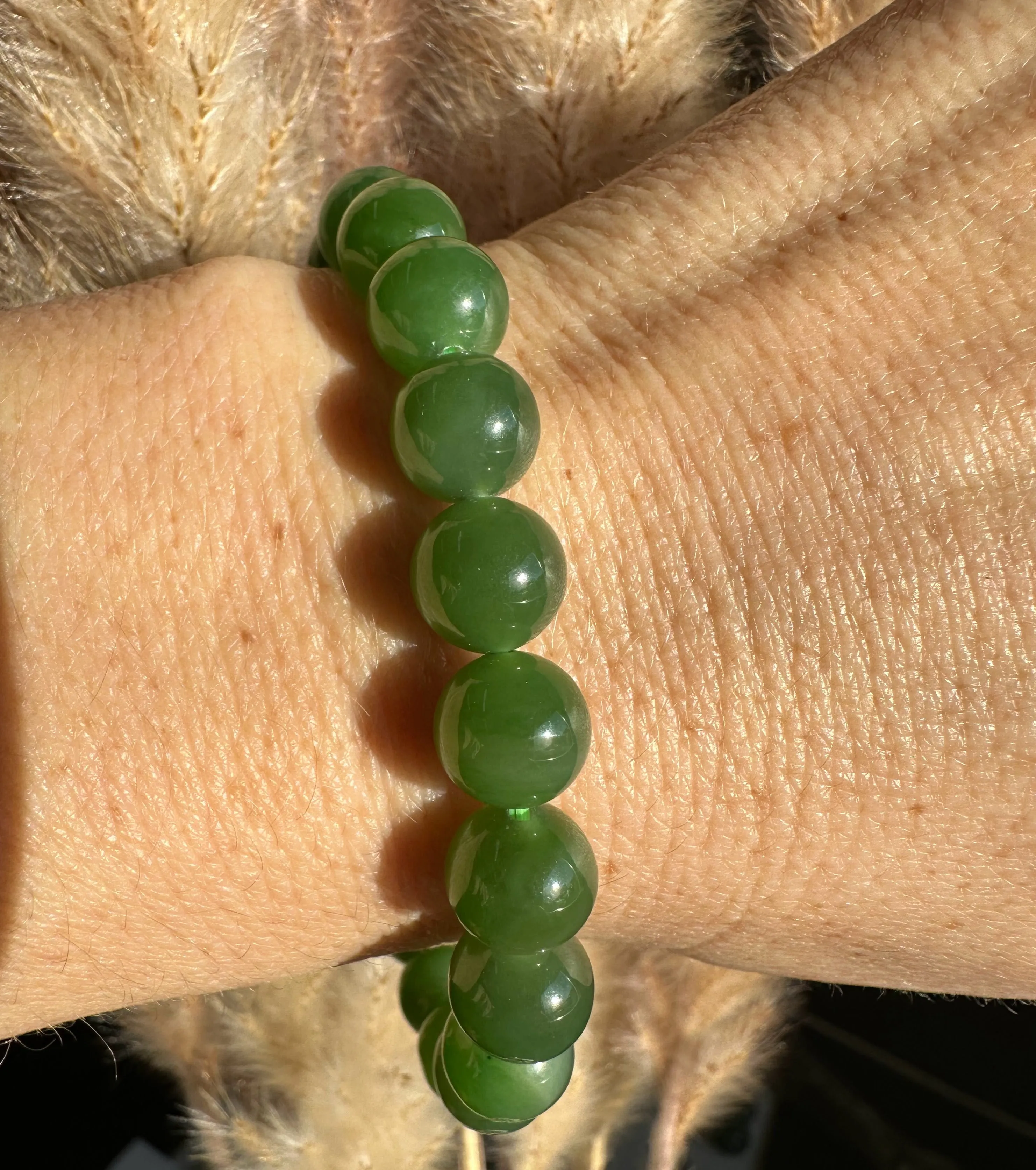 A  Canadian Jade 9mm bead bracelet