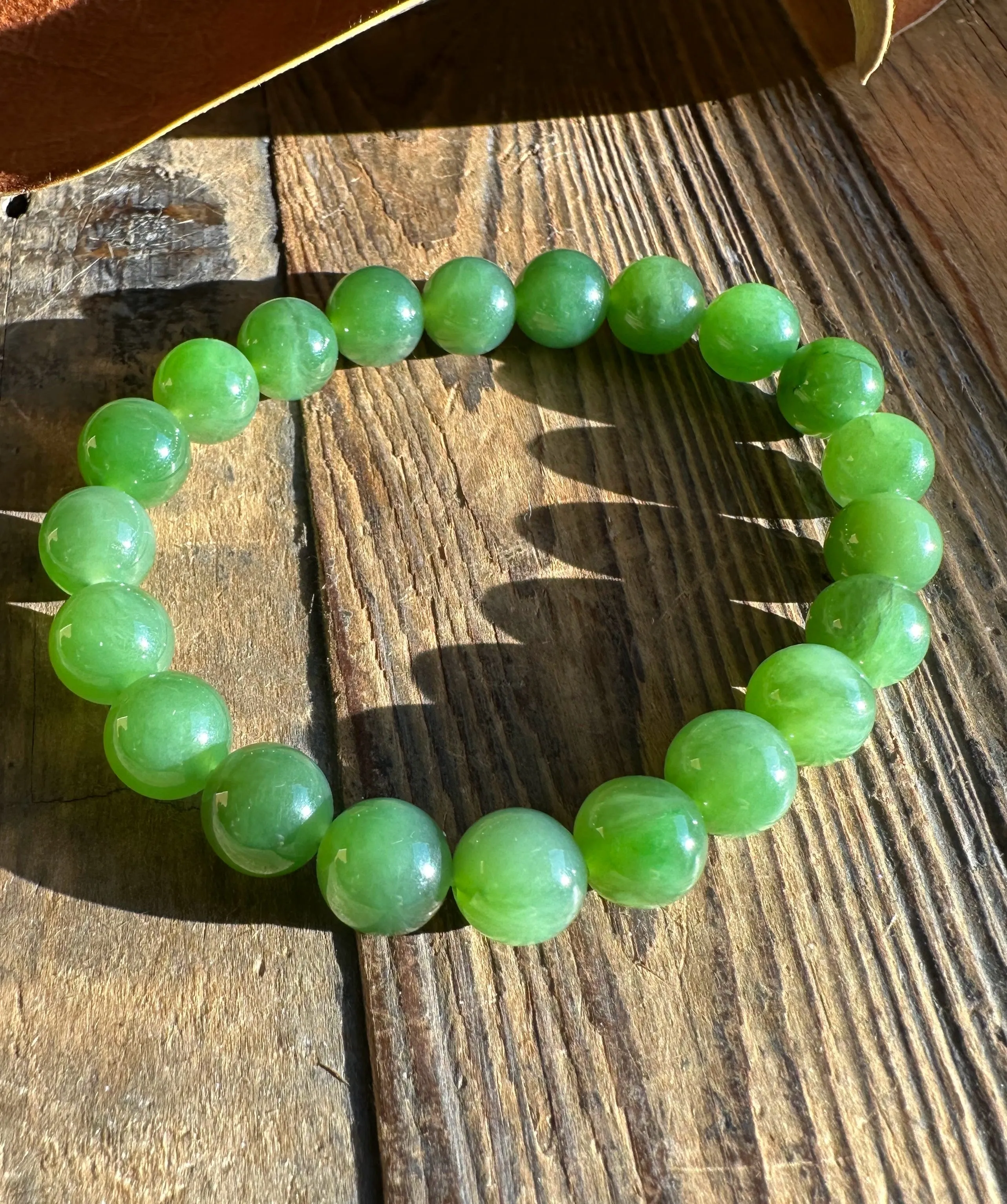A  Canadian Jade 9mm bead bracelet